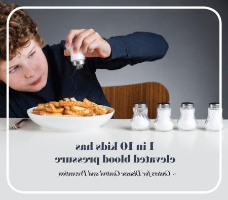 kid salting fries with quote